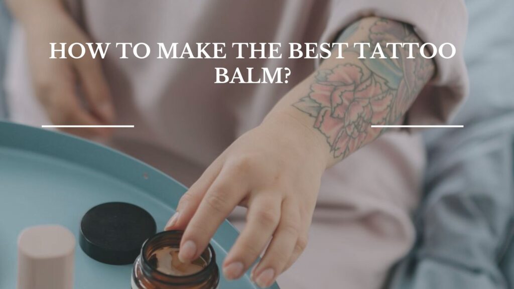 Here there is tattoo balm in a container from which the balm is being taken out with the help of a finger