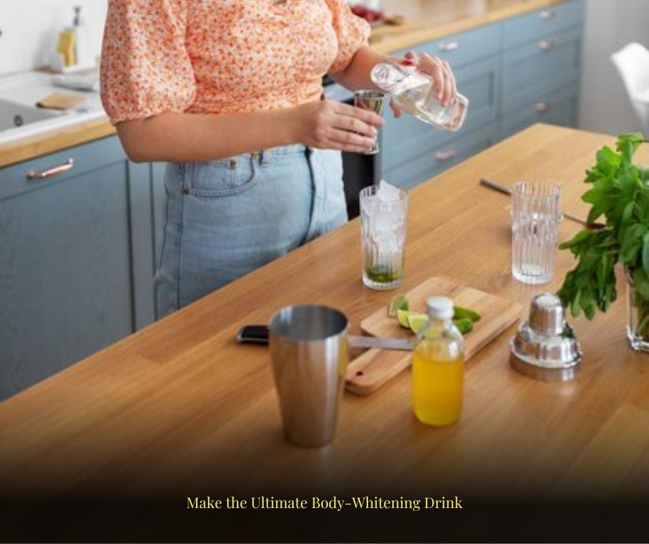 A woman prepares a refreshing body-whitening drink with natural ingredients in a modern kitchen.
