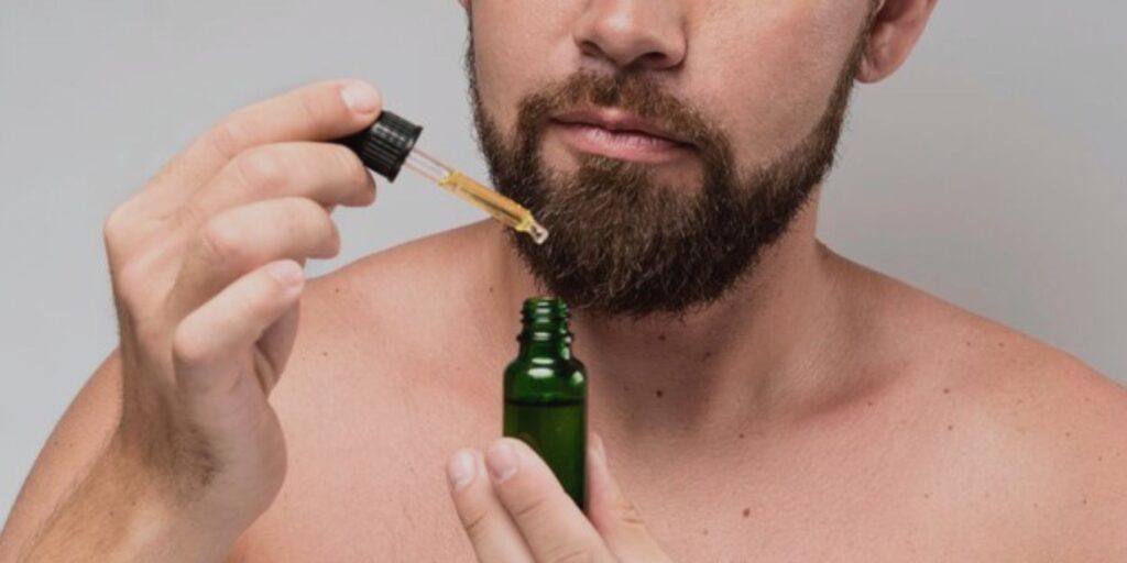Beard oil hydrates facial hair, softens texture, reduces itchiness, promotes growth, and gives a well-groomed look